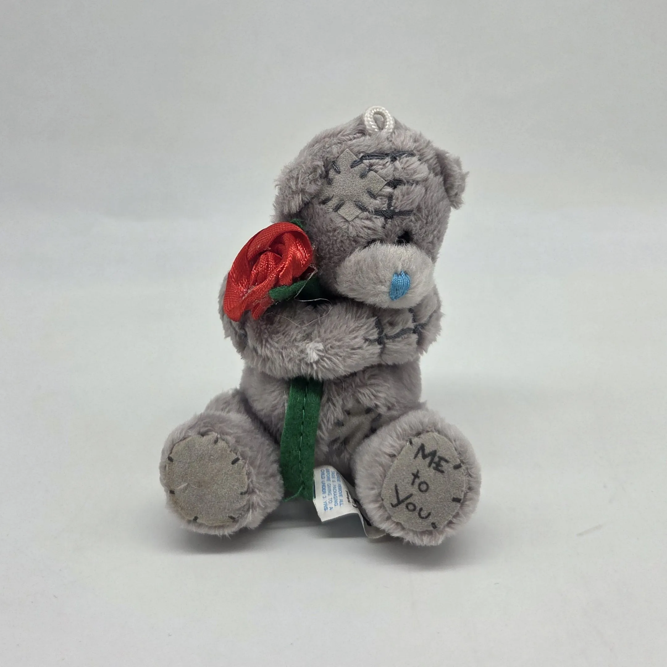 Мишка с цветочком цв.серый 9см Т-12 для кукол | 1