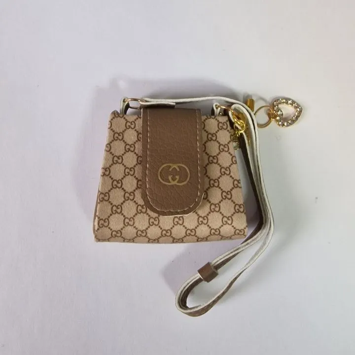 Сумочка LV С-55-9 ткань/искус.кожа цв.бежевый 5*5,5*1,5см для кукол