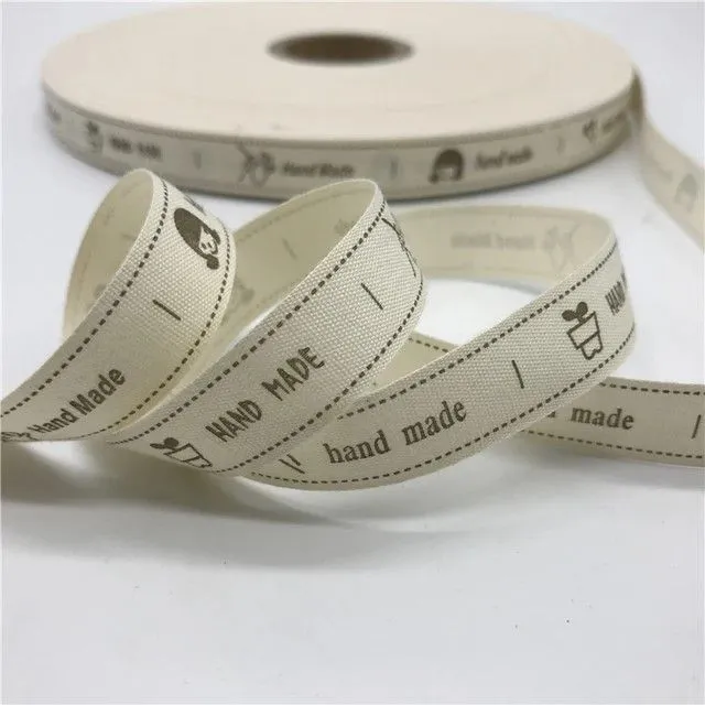 Хлопковая лента с надписью Hand Made 1,5см цв.ванильный (10 этикеток) НМ-08 для кукол | 1