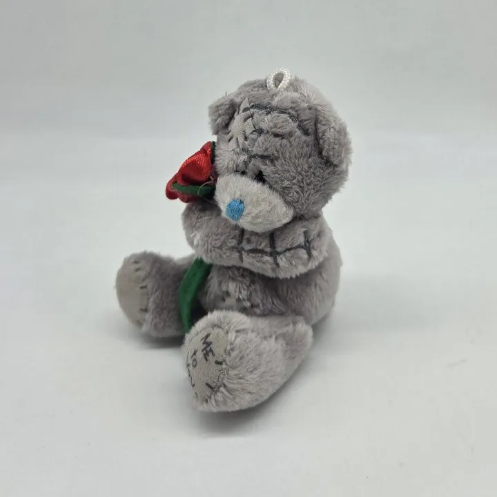 Мишка с цветочком цв.серый 9см Т-12 для кукол