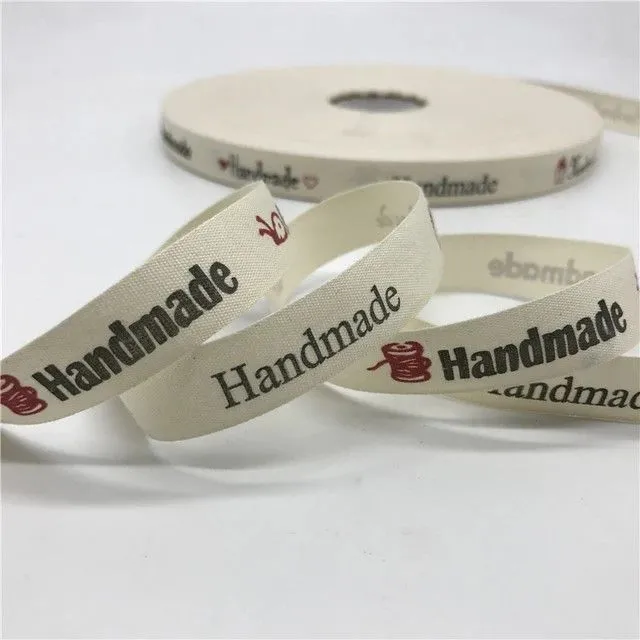 Хлопковая лента с надписью Hand Made 1,5см цв.ванильный (10 этикеток) НМ-06 для кукол | 1