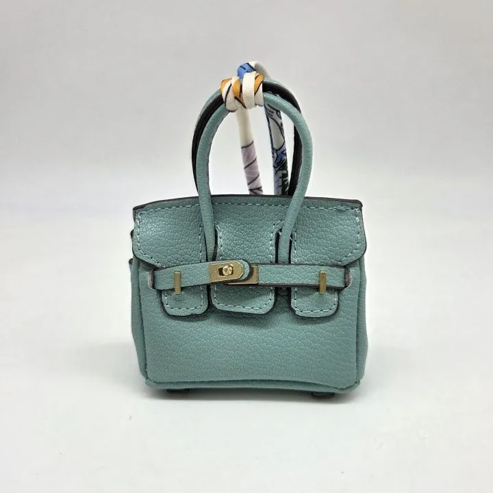 Сумка 7*7,5*3см цв.св.бирюзовый (01) С-156 для кукол