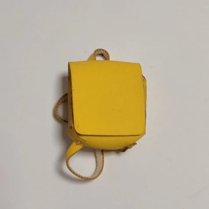 Рюкзак искусств.кожа 10*10*5см цв.желтый Р-37 для кукол