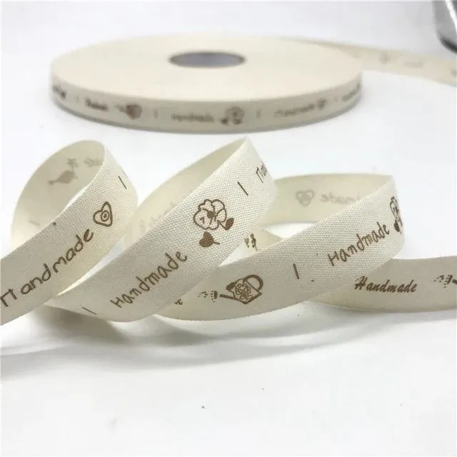 Хлопковая лента с надписью Hand Made 1,5см цв.ванильный (10 этикеток) НМ-07 для кукол