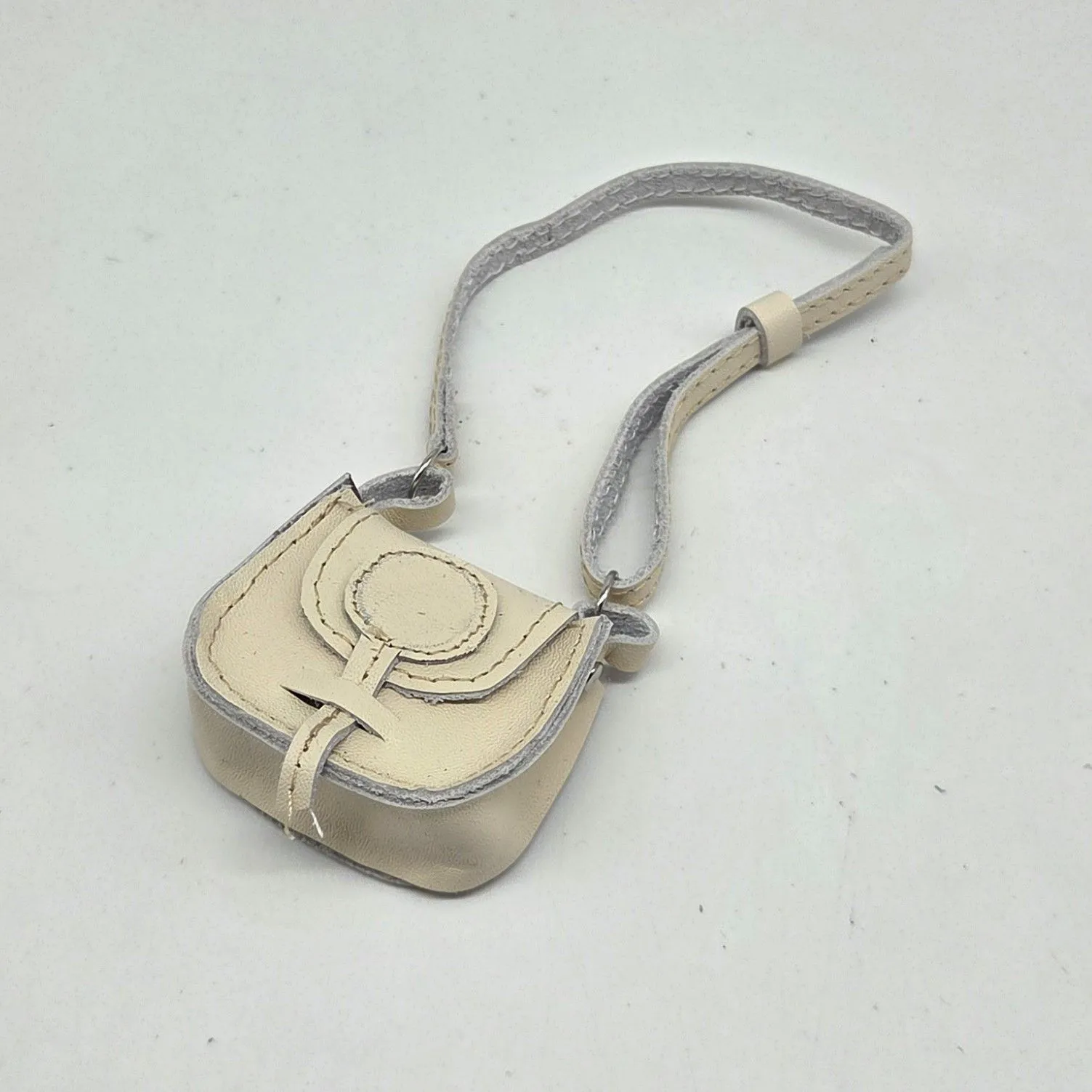 Сумочка С-142 натур.кожа 4,7*4,3*2см цв.топлёное молоко (03) для кукол | 2