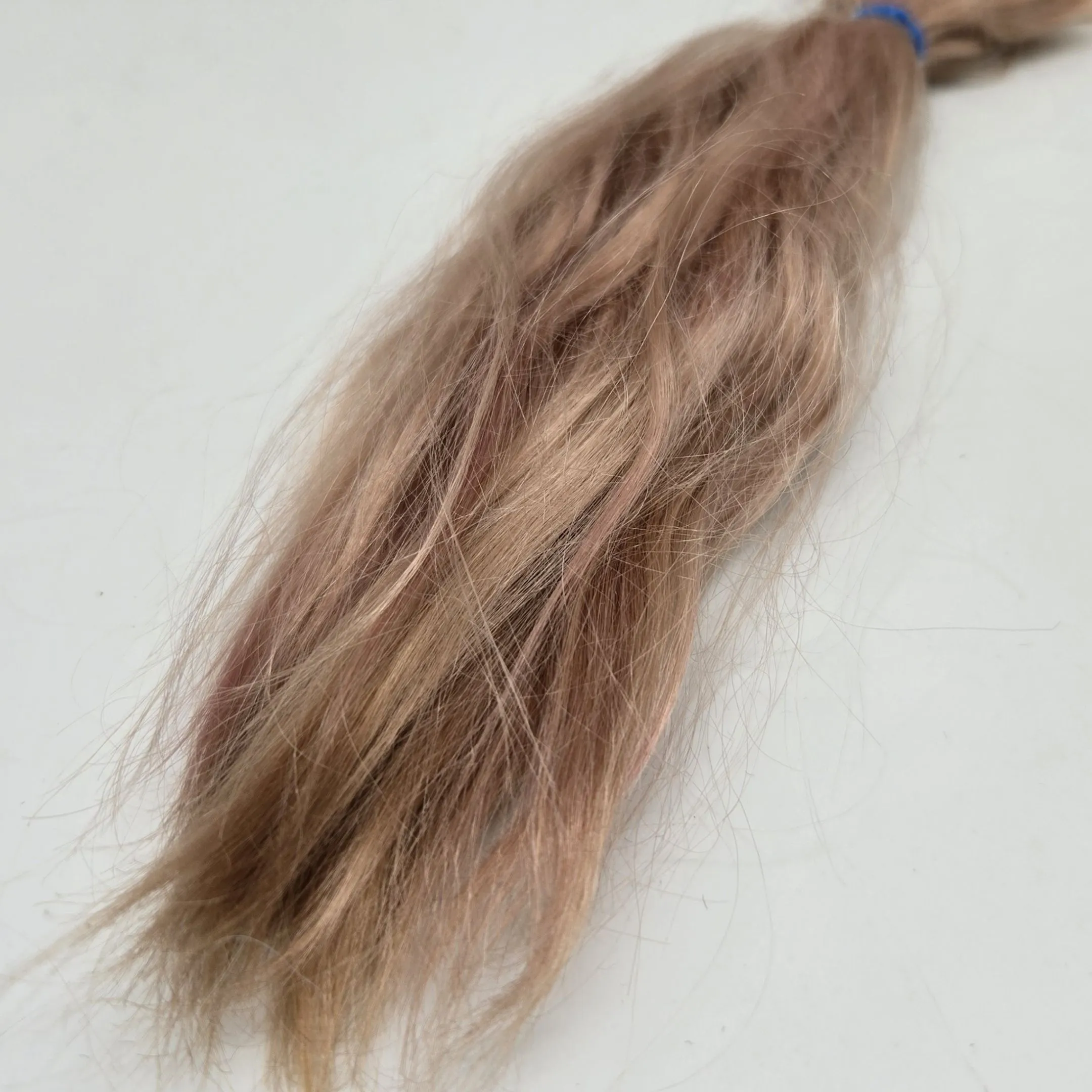 Пряди козочки 10гр цв.бежевый с розовым оттенком дл.22см ПР-45 для кукол | 1